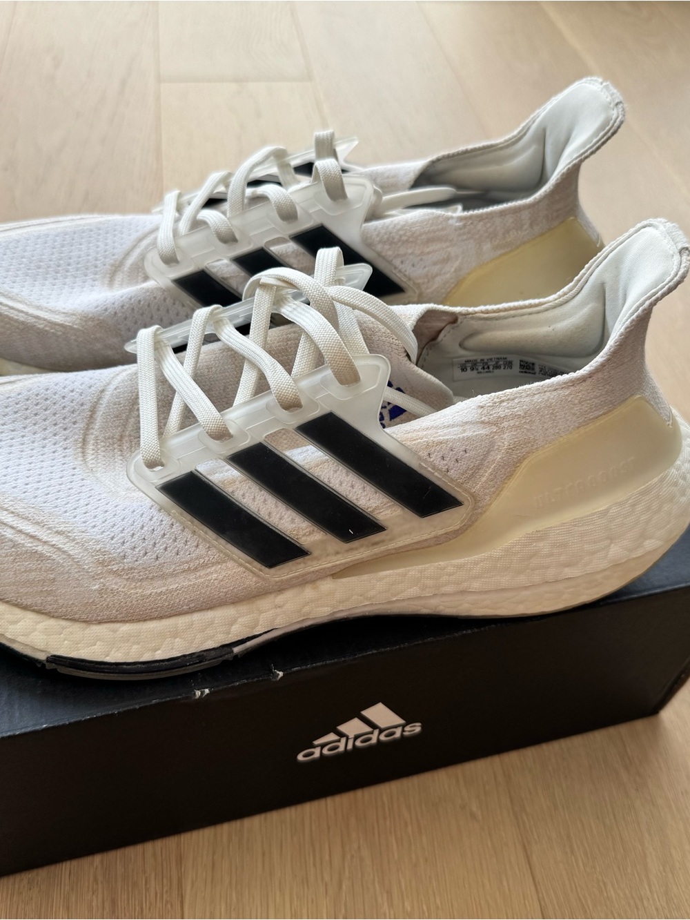 adidas White Sneakers with Black Three Stripes